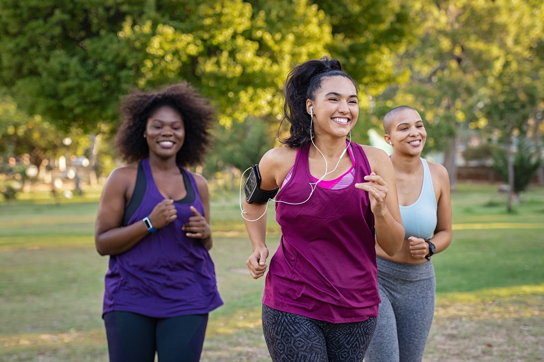Group,Of,Curvy,Girls,Friends,Jogging,Together,At,Park.,Beautiful